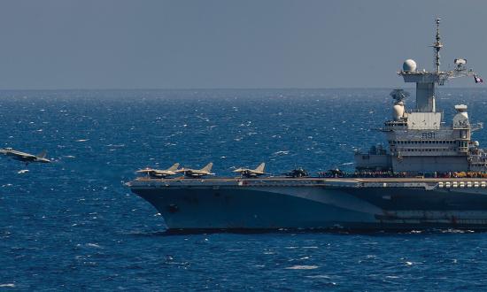 U.S. Navy F/A-18E launches from the French carrier Charles de Gaulle