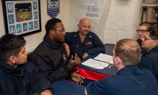 Sailors on board the Arleigh Burke–class guided-missile destroyer USS Jason Dunham (DDG-109)