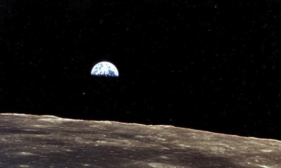 Earthrise over the moon as seen from Apollo 11