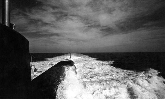 View looking aft down the port side of the USS Sam Houston (SSBN-609) underway in September 1962