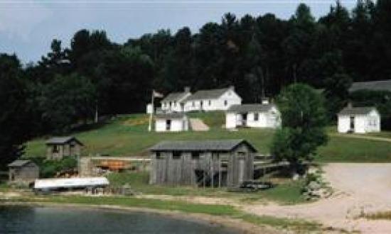 At Discovery Harbour, a recreated 19th-century Royal Navy base includes the sawmill (foreground), behind which stand barracks, the surveyor's home and office, and a doctor's office.